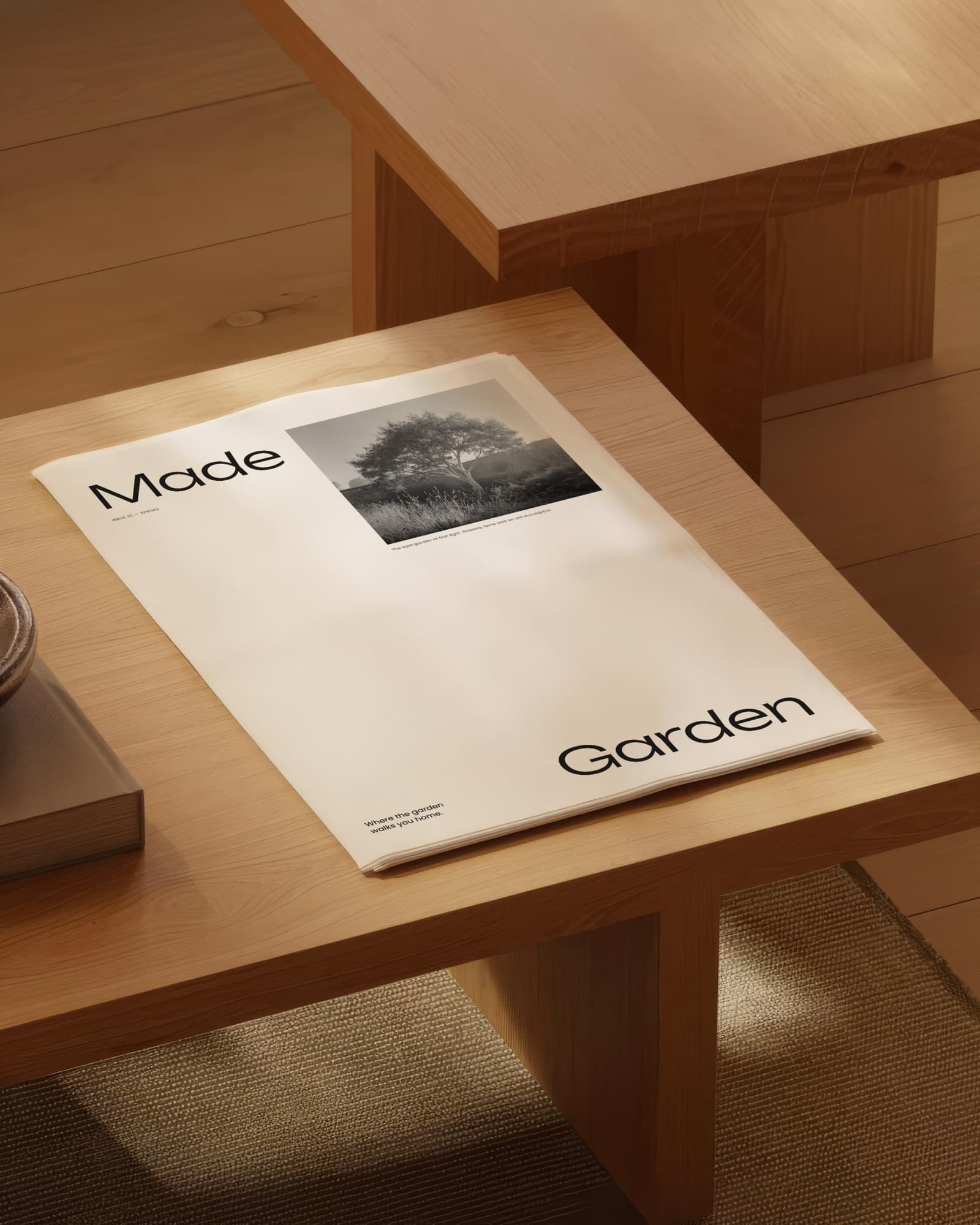 The cover of Made, a garden magazine, lying on a light oak table in soft window light